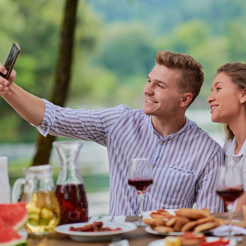 happy single couple taking photo